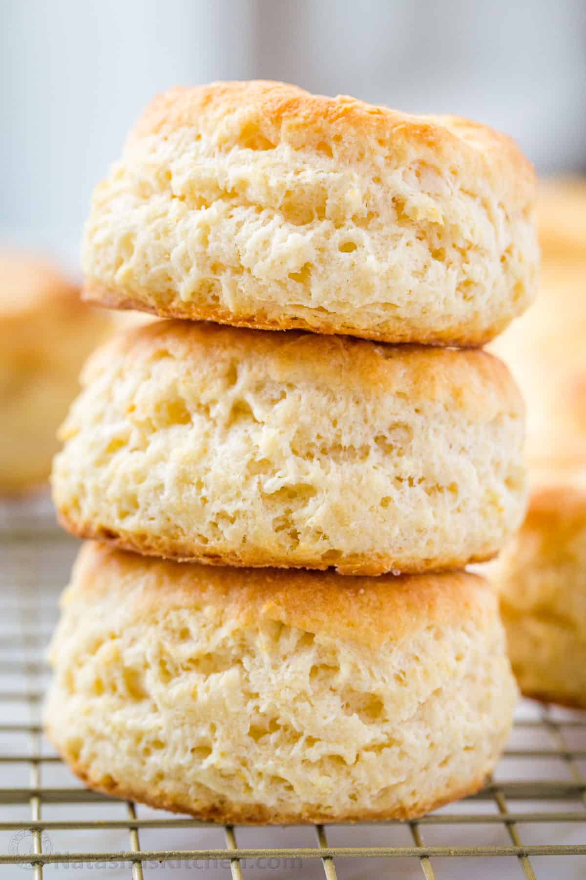 three fluffy biscuits stacked