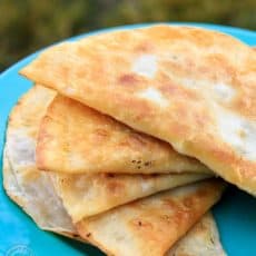 A blue plate with Lena's chebureki on the plate