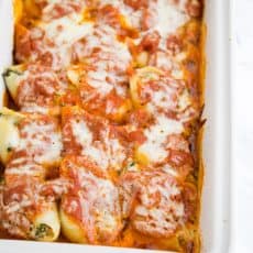 These lasagna stuffed shells are easier than making lasagna but are just as satisfying! @natashaskitchen